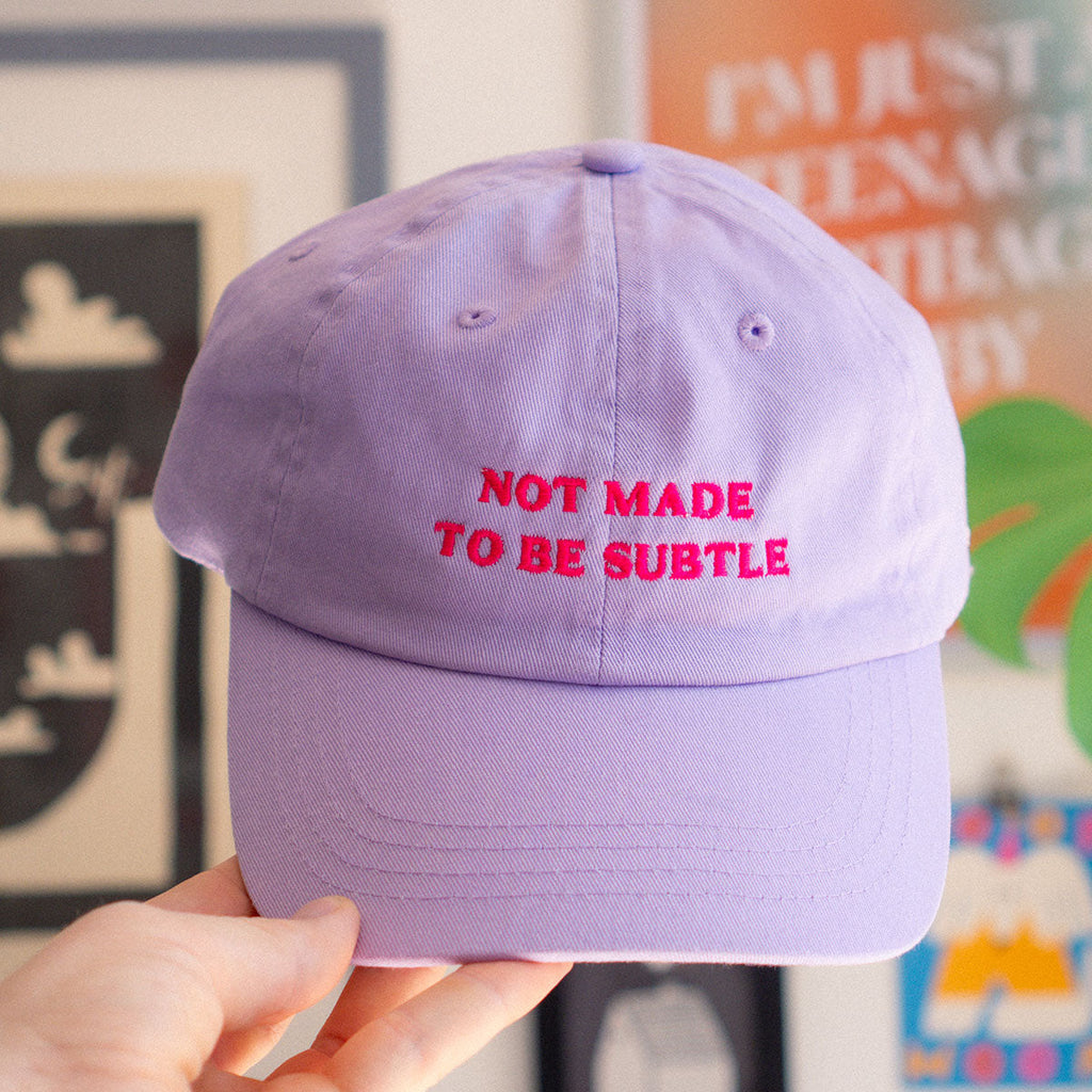 Not Made To Be Subtle Slogan Cap